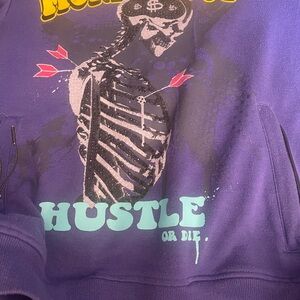 Shirt is blue and purple